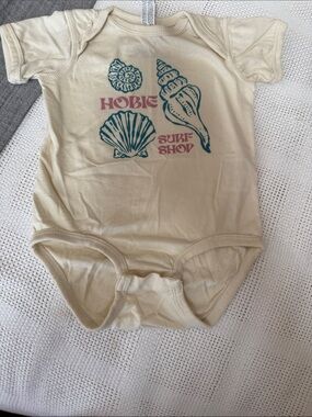 Hobie Cream One-Piece with Teal Shell Graphics and Pink Logo